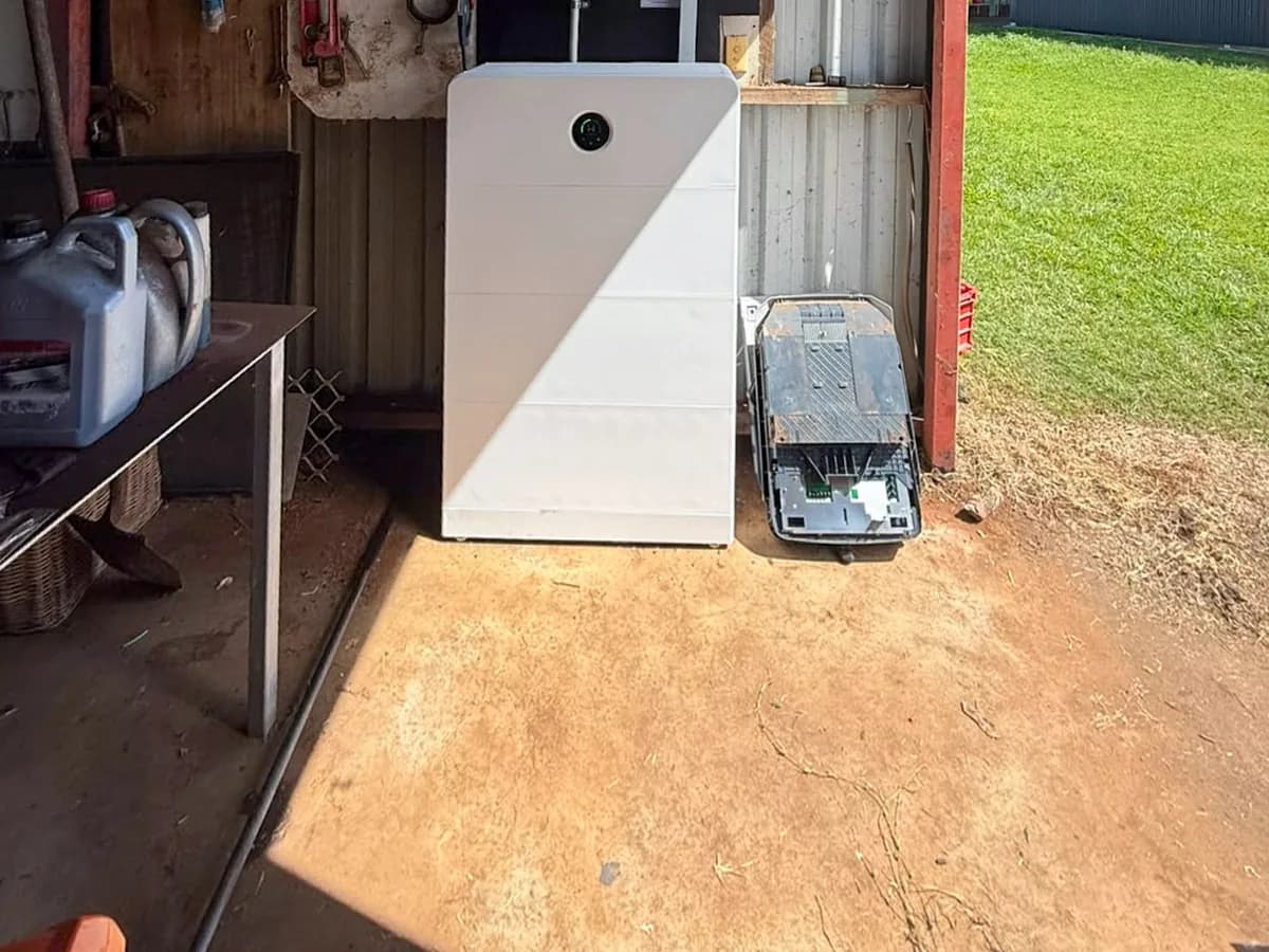 A home battery installed by EFS Solar in a rural shed at Clunes, wired to the switchboard above