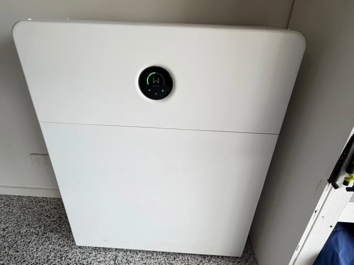 A home battery installed by EFS Solar against an interior wall at a North Lakes home